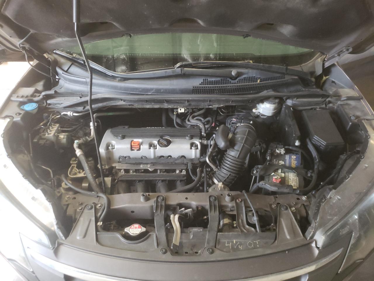 Photo 7 from auction – 2014 HONDA CR-V LX with VIN 2HKRM4H33EH689494