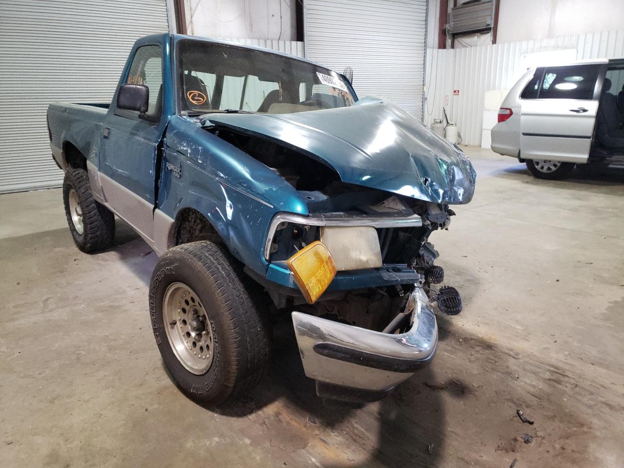 FORD RANGER 1990 with VIN 1FTCR10A5RPA25384 - Photo from auction