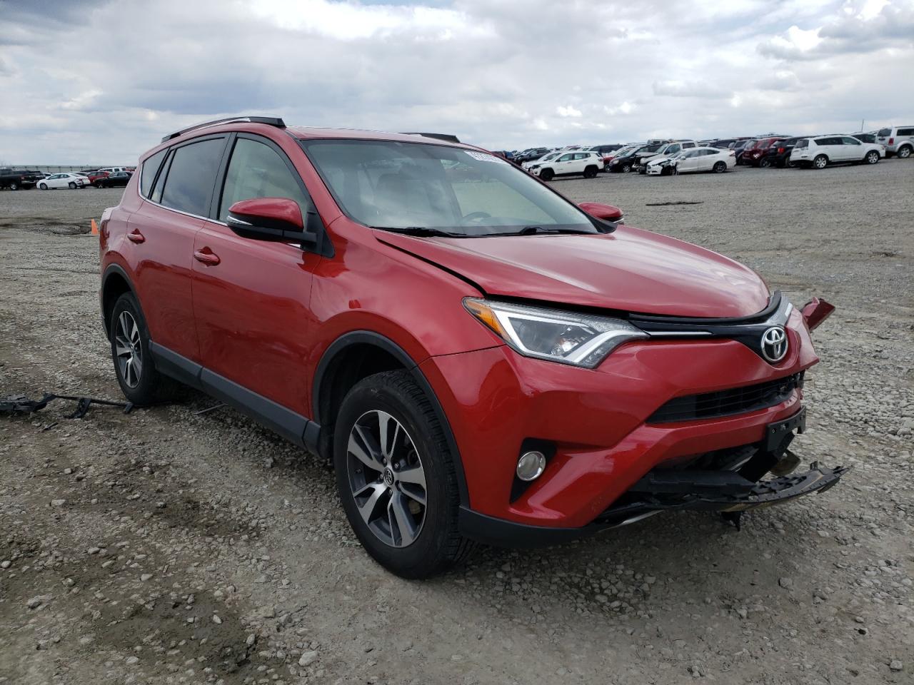 TOYOTA RAV4 XLE 2016 with VIN JTMRFREV4GJ088716 - Photo from auction