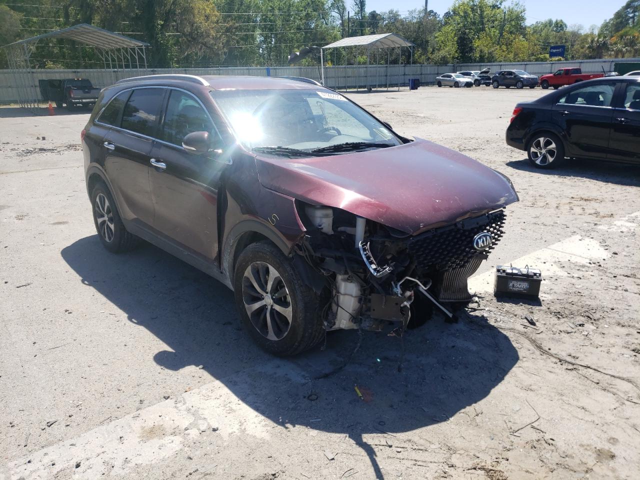 KIA SORENTO EX 2016 with VIN 5XYPH4A13GG142479 - Photo from auction