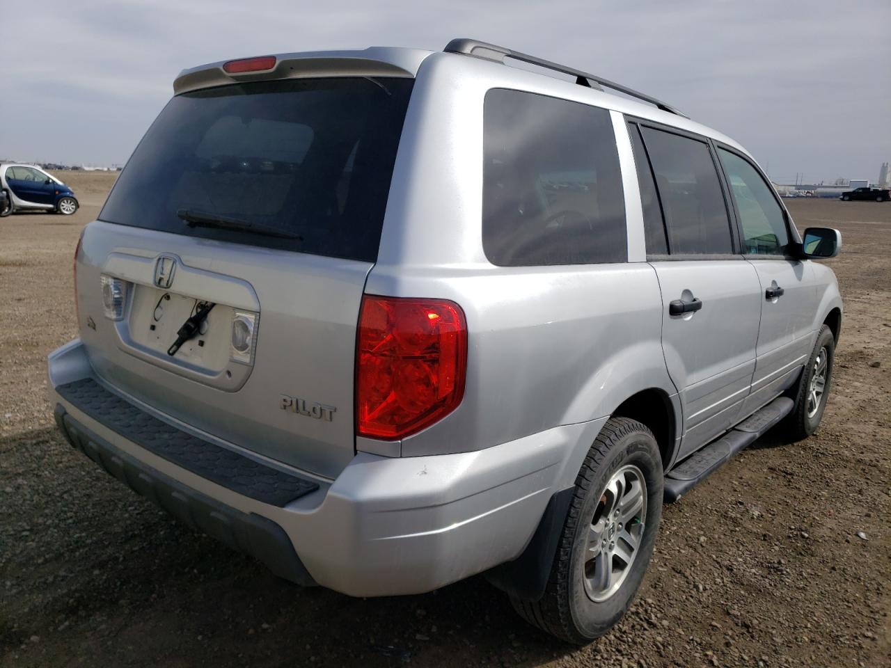 Photo 4 from auction – 2004 HONDA PILOT EX with VIN 2HKYF18434H000291