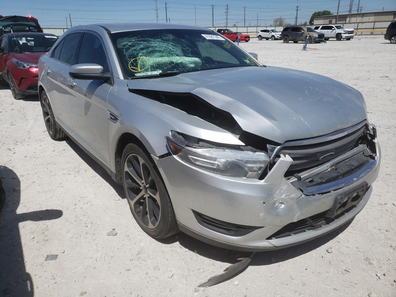 FORD TAURUS SEL 2015 with VIN 1FAHP2E85FG102215 - Photo from auction