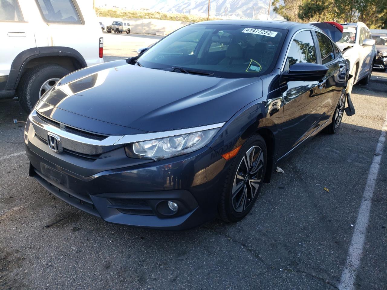 Photo 2 from auction – 2016 HONDA CIVIC EX with VIN 19XFC1F38GE015095