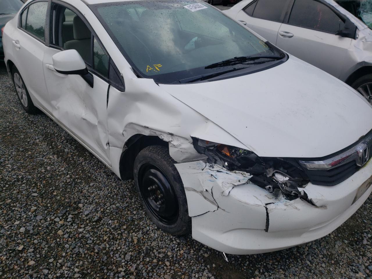 Photo 9 from auction – 2012 HONDA CIVIC LX with VIN JHMFB2F52CS004271