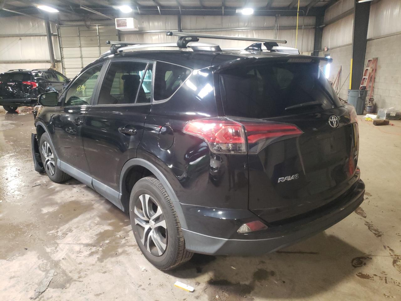 Photo 3 from auction – 2016 TOYOTA RAV4 LE with VIN 2T3BFREV7GW520766