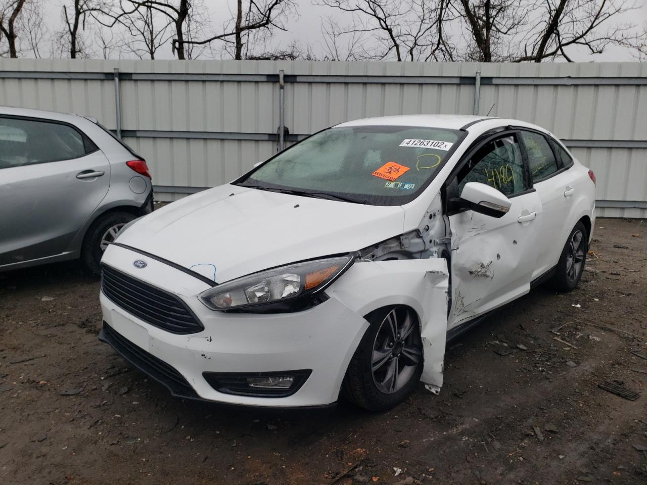 Photo 2 from auction – 2017 FORD FOCUS SE with VIN 1FADP3FE3HL289764