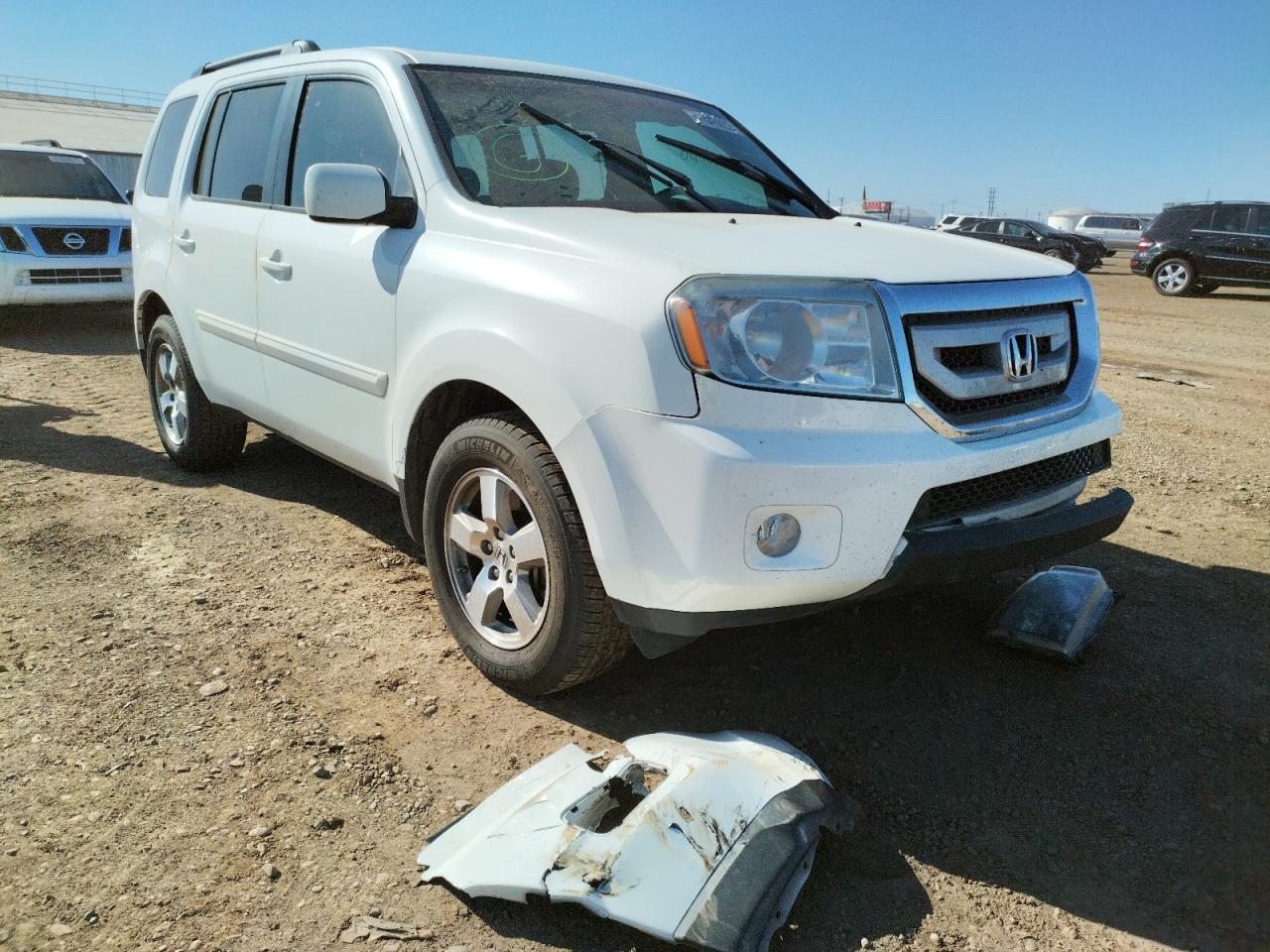 HONDA PILOT EX 2011 with VIN 5FNYF3H47BB043894 - Photo from auction