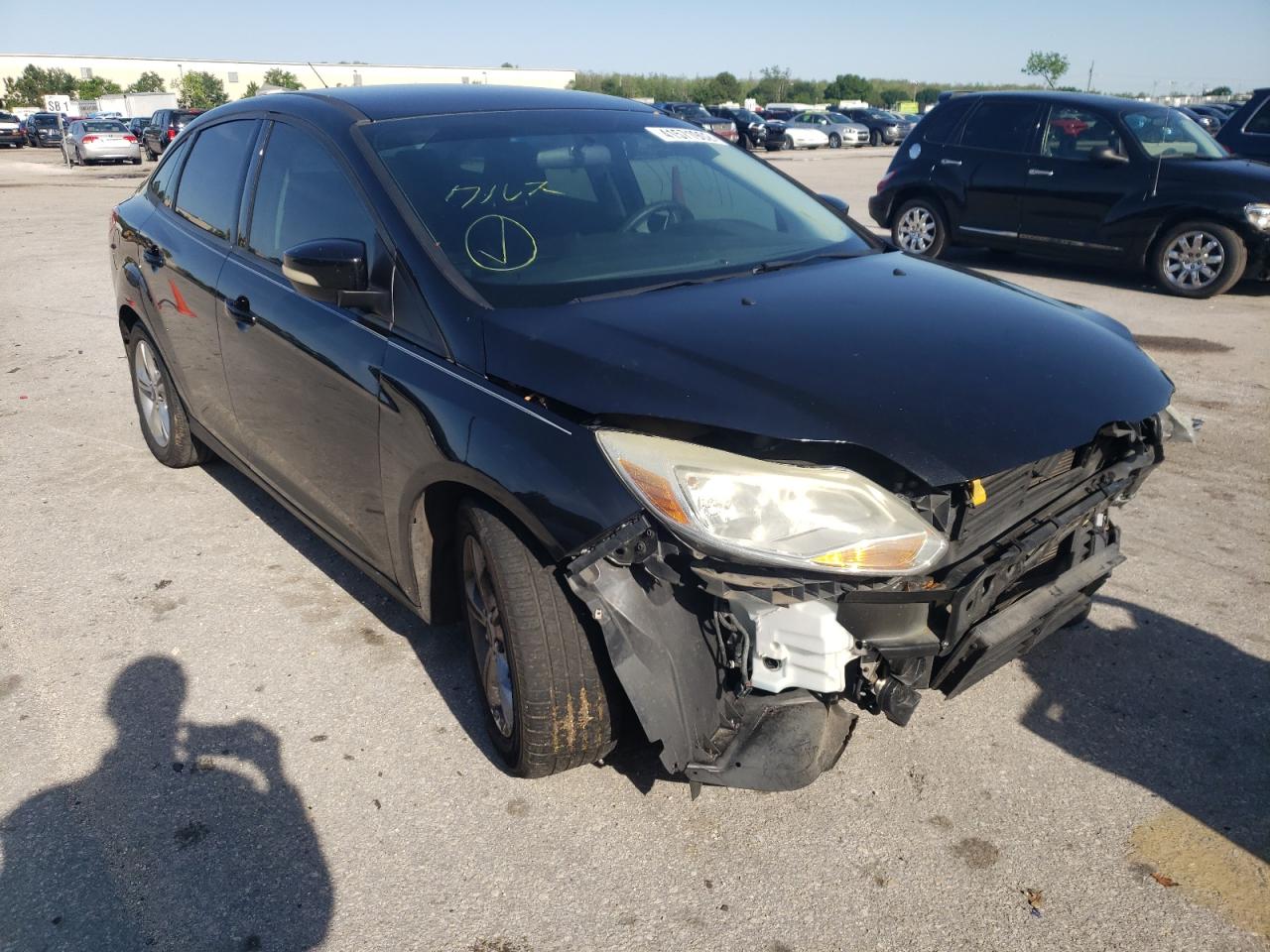 FORD FOCUS SE 2014 with VIN 1FADP3F29EL252140 - Photo from auction