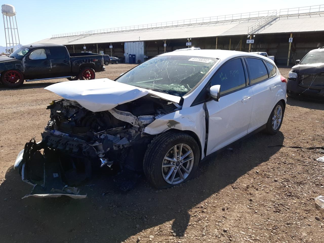 Photo 2 from auction – 2016 FORD FOCUS SE with VIN 1FADP3K20GL254450