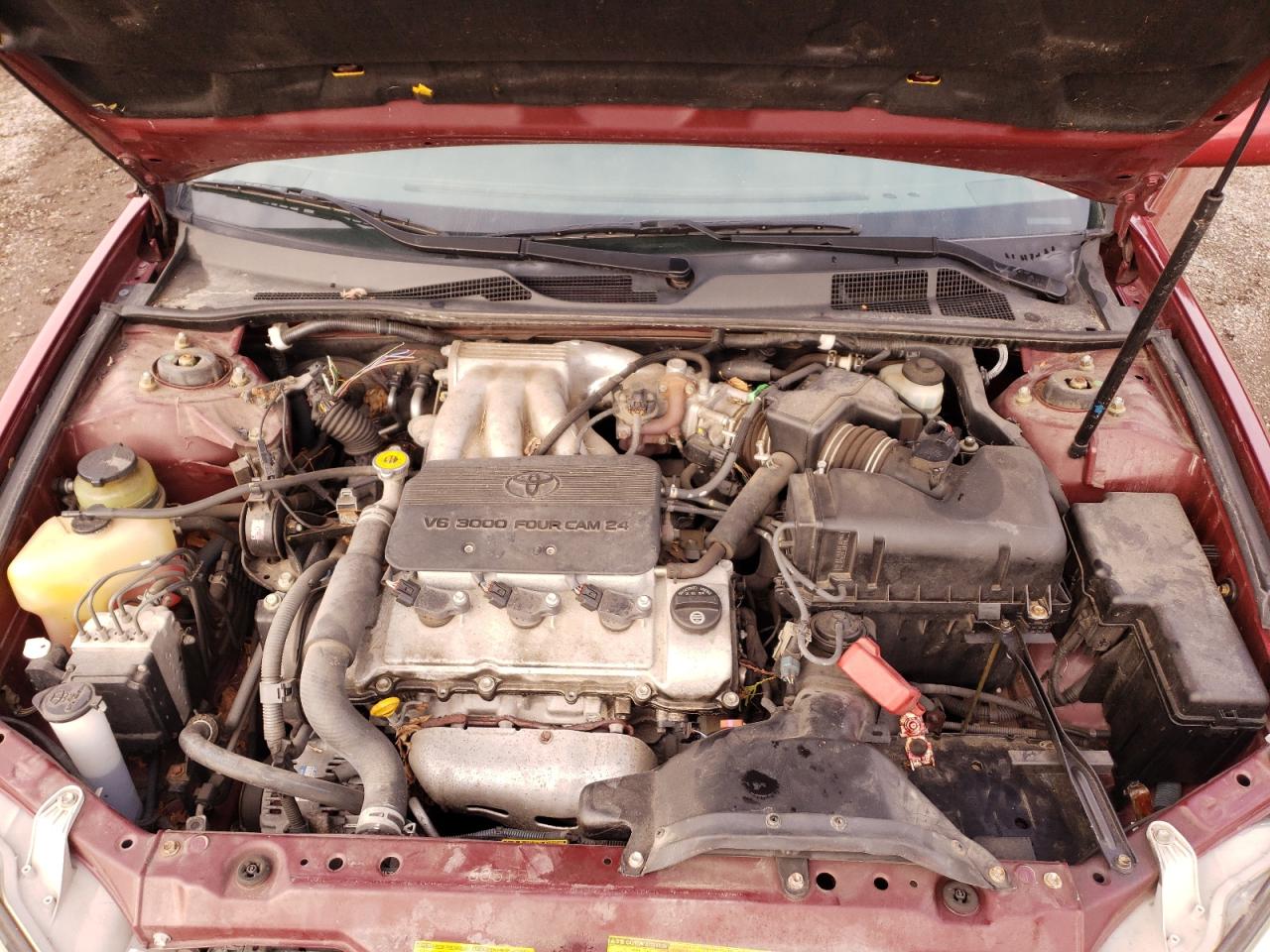 Photo 7 from auction – 2002 TOYOTA CAMRY LE with VIN JTDBF30K020014882