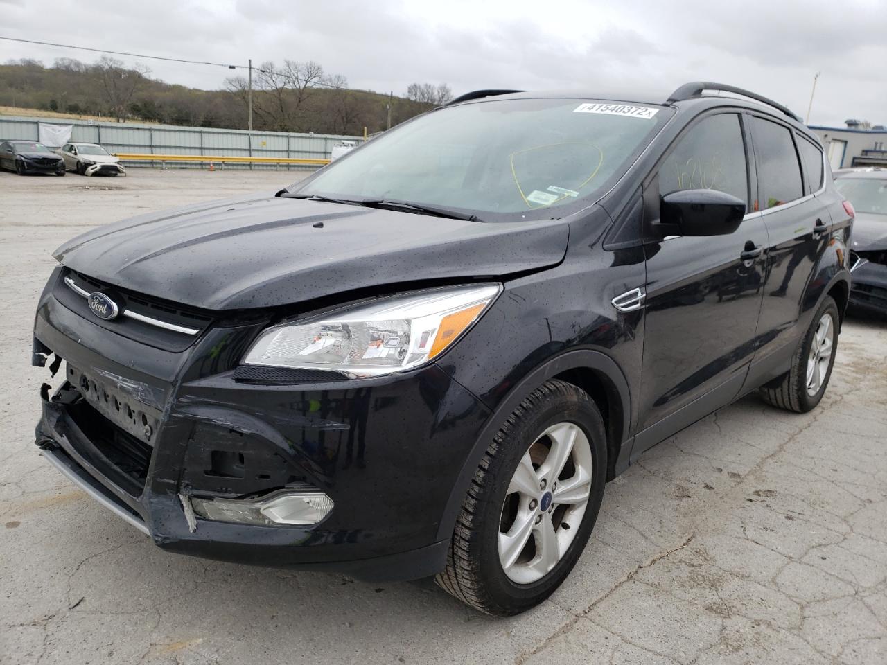 Photo 2 from auction – 2014 FORD ESCAPE SE with VIN 1FMCU0GX3EUD91502