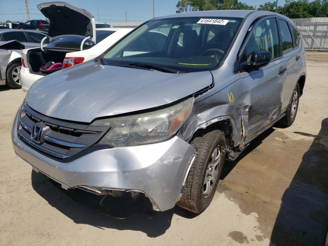 Photo 2 from auction – 2014 HONDA CR-V LX with VIN 2HKRM3H30EH563233