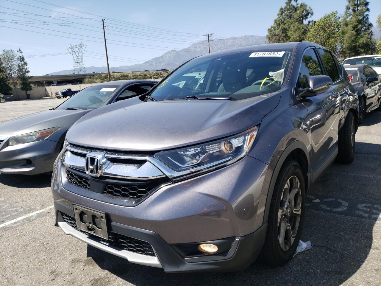 Photo 2 from auction – 2017 HONDA CR-V EX with VIN 7FARW1H54HE031149