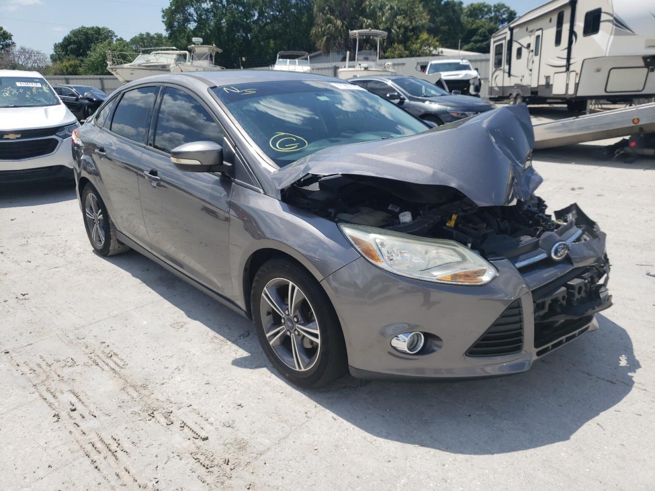 FORD FOCUS SE 2014 with VIN 1FADP3F24EL339279 - Photo from auction