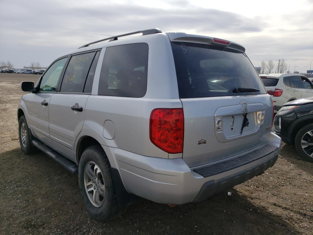 Photo 3 from auction – 2004 HONDA PILOT EX with VIN 2HKYF18434H000291