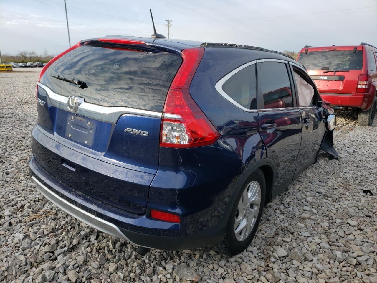 Photo 4 from auction – 2015 HONDA CR-V EXL with VIN 5J6RM4H73FL058643