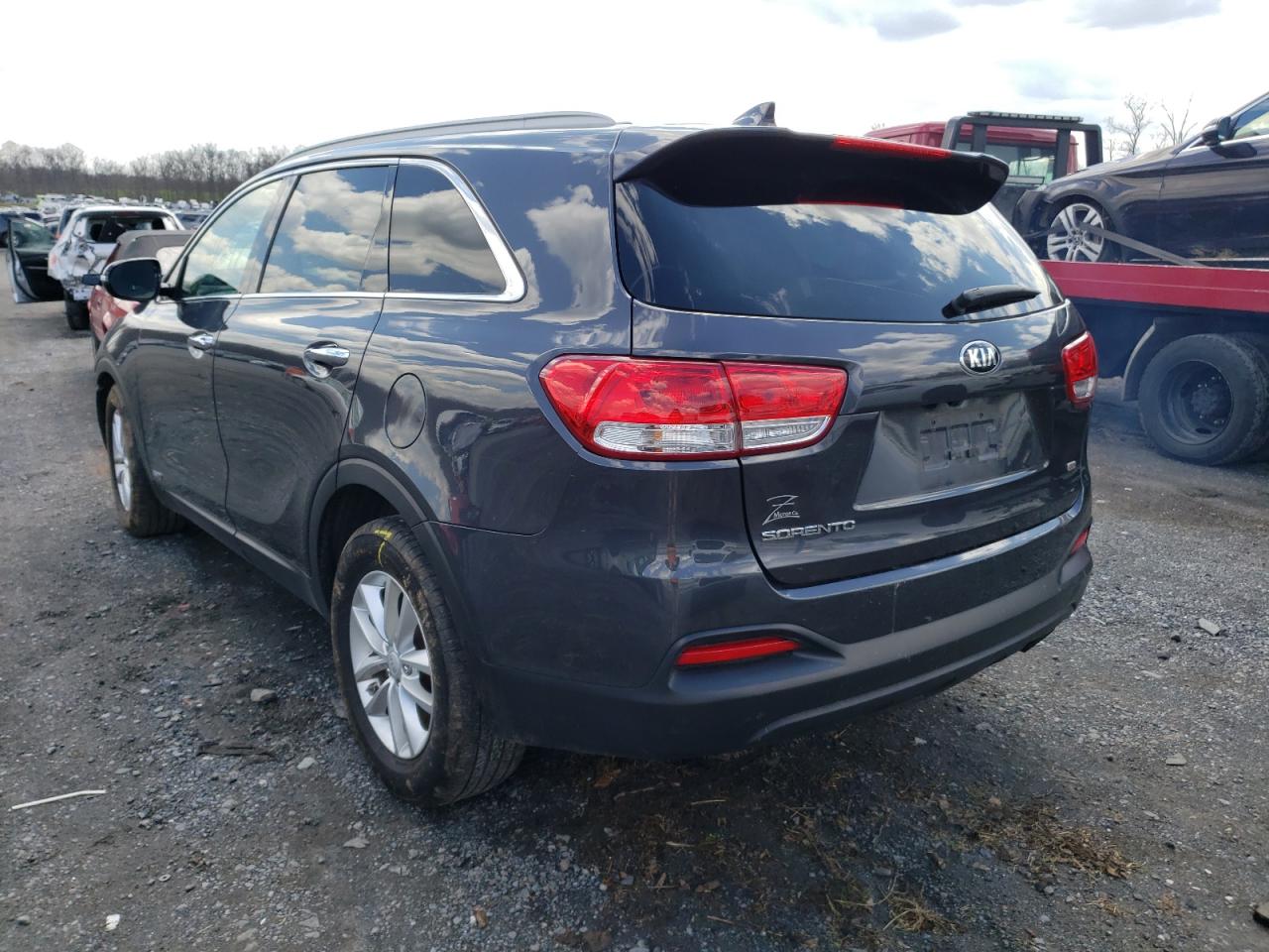 Photo 3 from auction – 2016 KIA SORENTO LX with VIN 5XYPGDA37GG045077