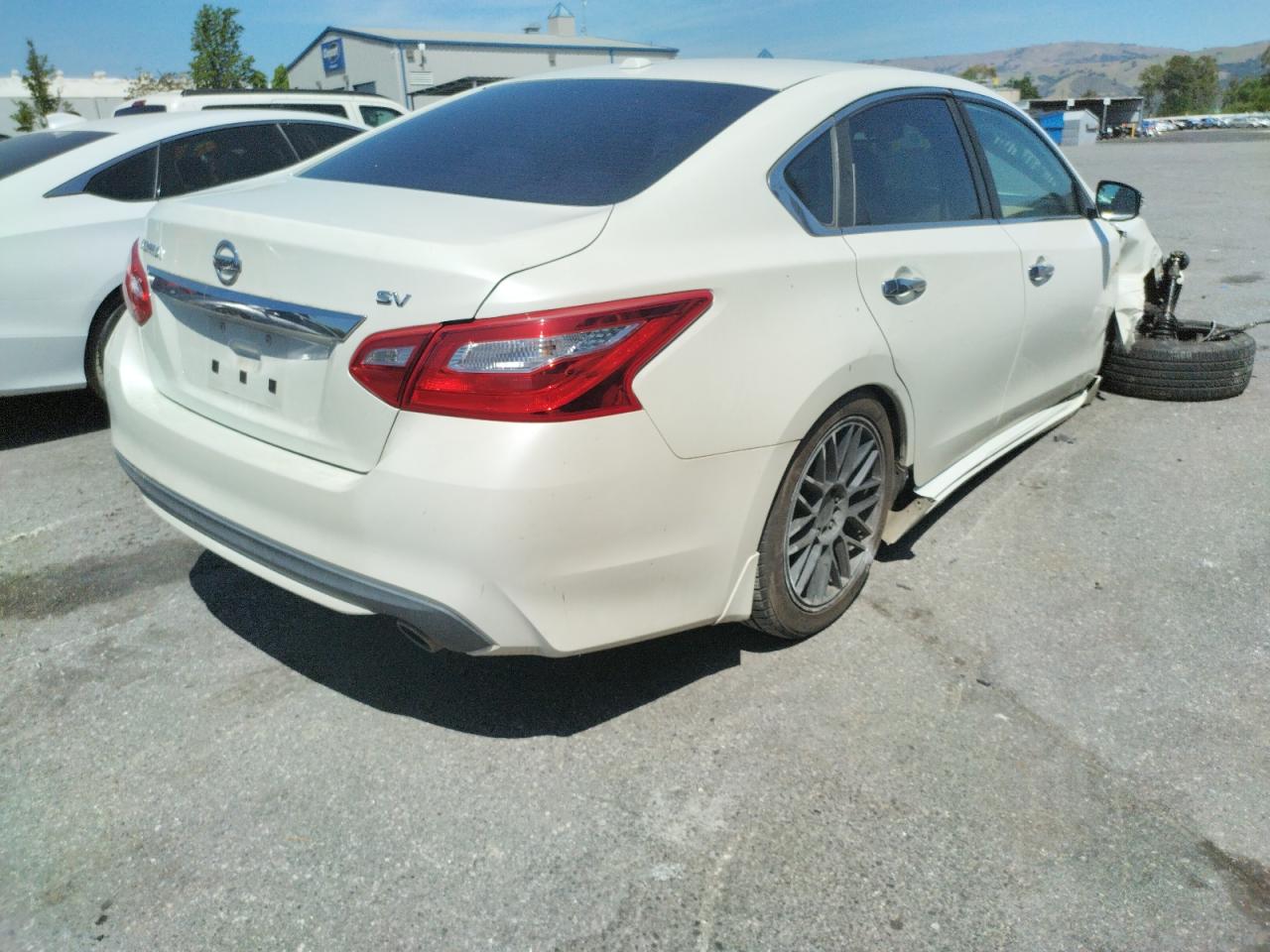 Photo 4 from auction – 2016 NISSAN ALTIMA 2.5 with VIN 1N4AL3AP6GC272835