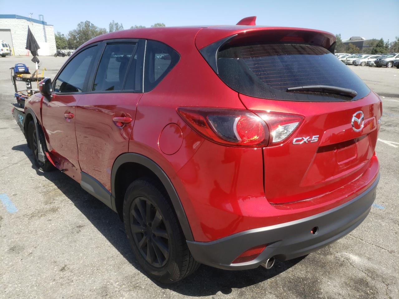 Photo 3 from auction – 2015 MAZDA CX-5 SPORT with VIN JM3KE2BE2F0548726