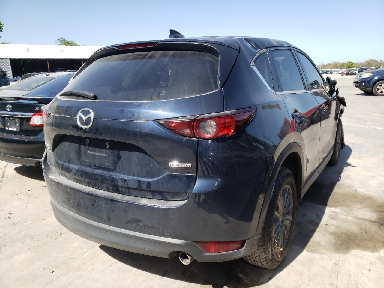 Photo 4 from auction – 2021 MAZDA CX-5 TOURI with VIN JM3KFBCM1M0342619