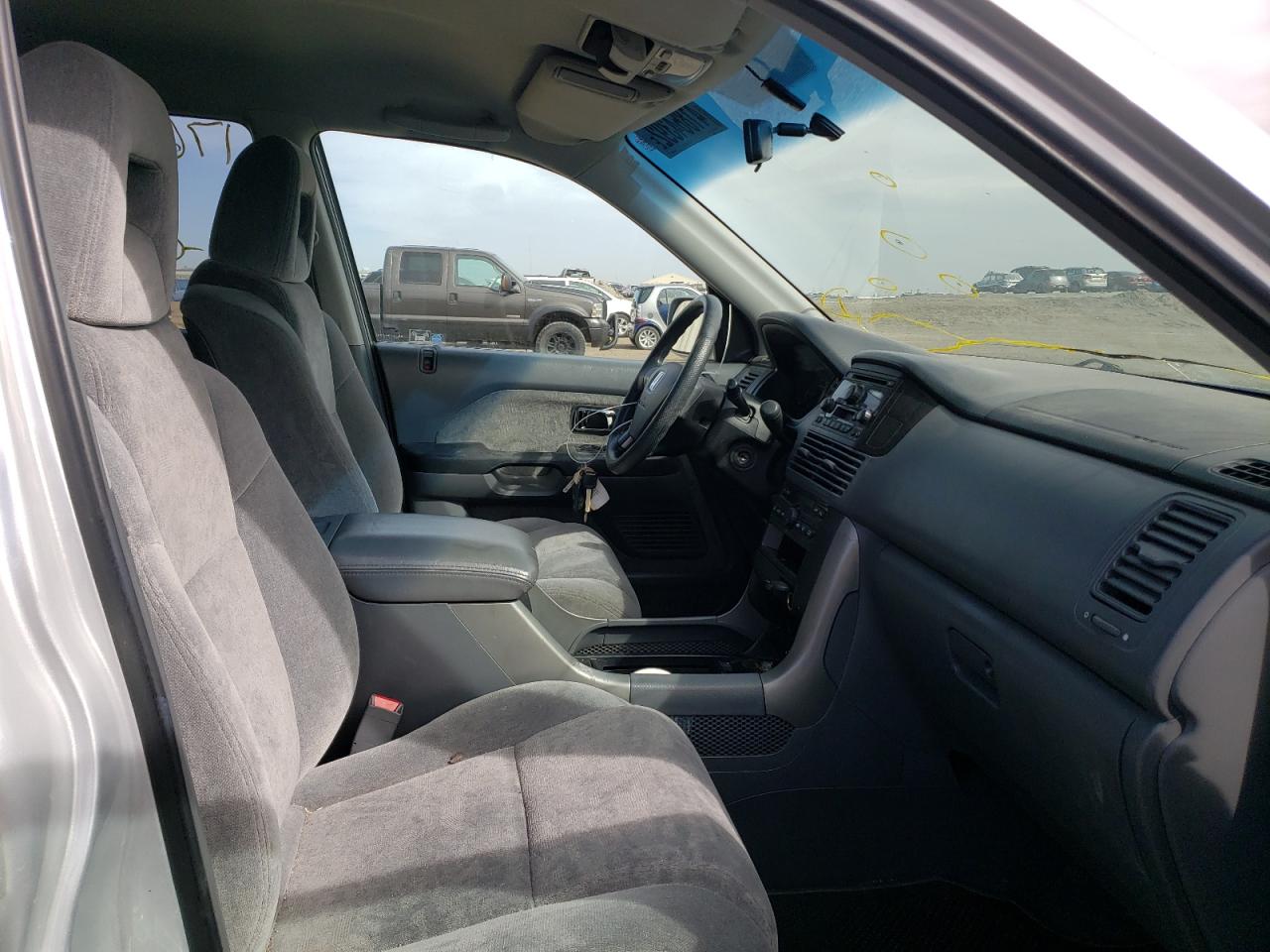 Photo 5 from auction – 2004 HONDA PILOT EX with VIN 2HKYF18434H000291