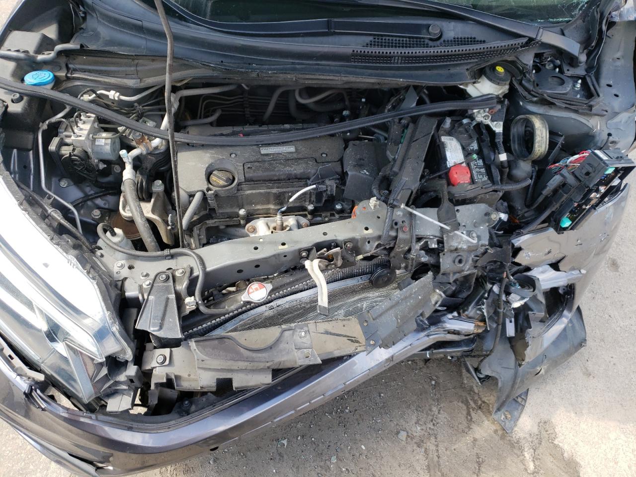 Photo 7 from auction – 2016 HONDA CR-V SE with VIN 2HKRM4H4XGH678374