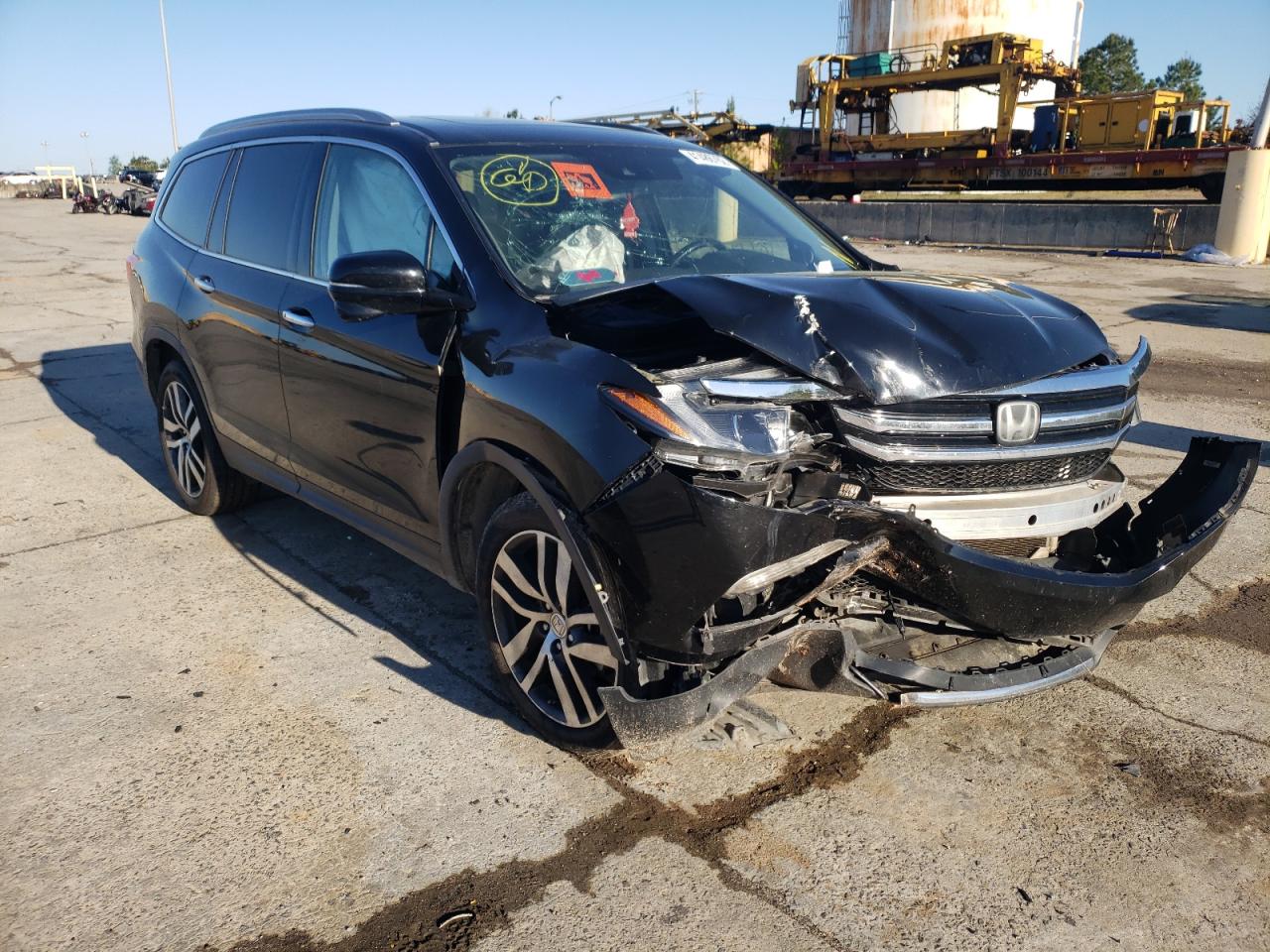 HONDA PILOT TOUR 2016 with VIN 5FNYF5H90GB026353 - Photo from auction
