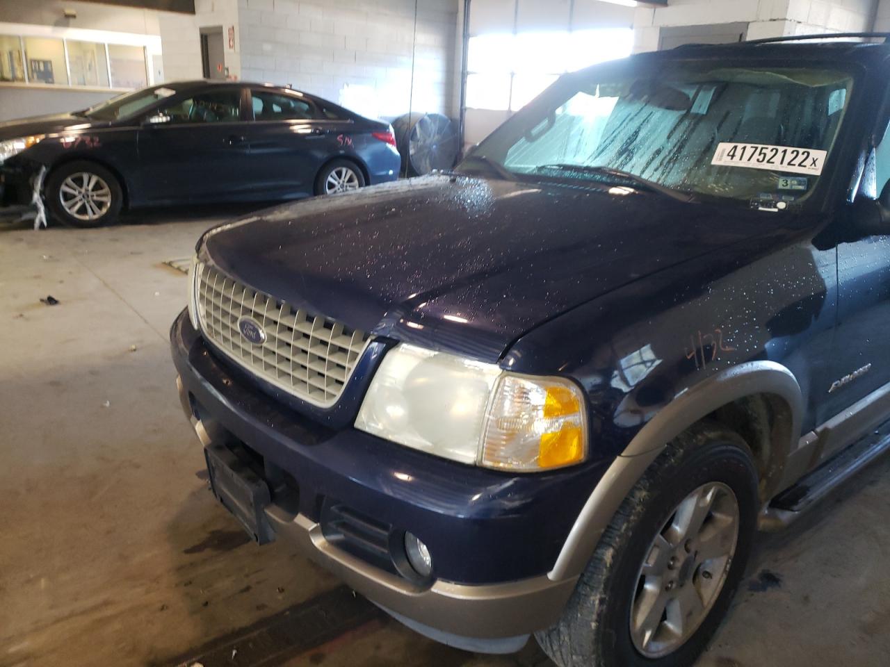 Photo 9 from auction – 2004 FORD EXPLORER E with VIN 1FMZU74E34UC10659
