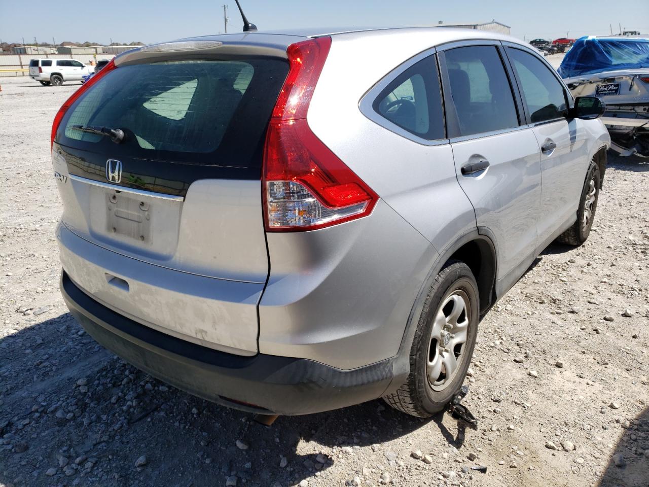 Photo 4 from auction – 2014 HONDA CR-V LX with VIN 3CZRM3H35EG710133