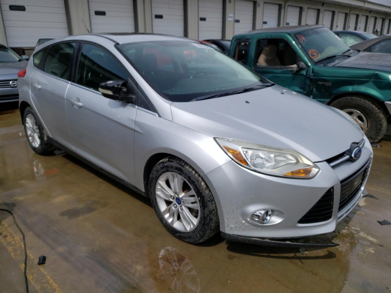 FORD FOCUS SEL 2012 with VIN 1FAHP3M21CL263179 - Photo from auction