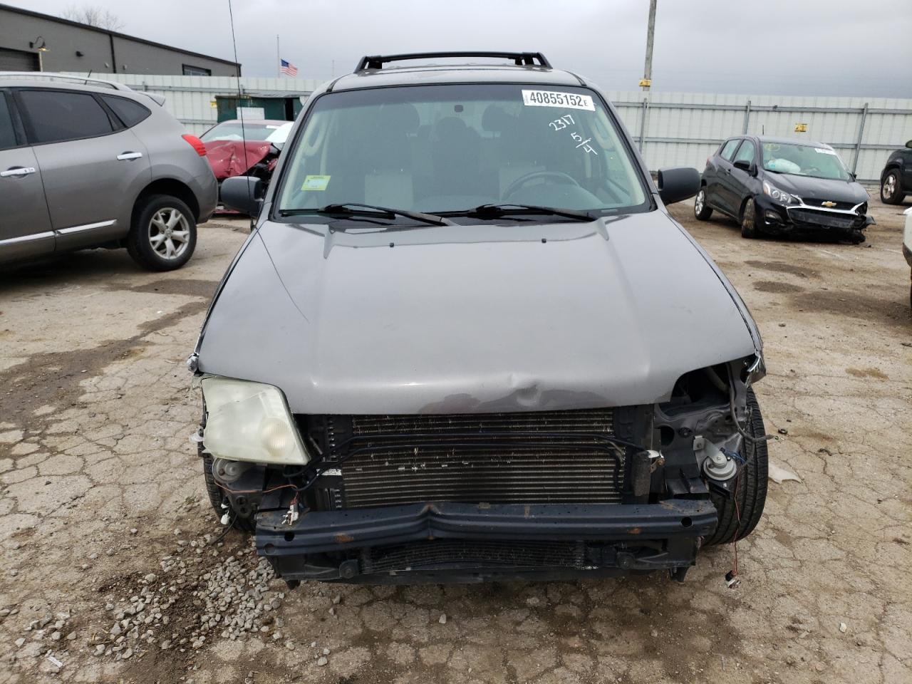 Photo 9 from auction – 2006 MERCURY MARINER with VIN 4M2YU56106DJ02317