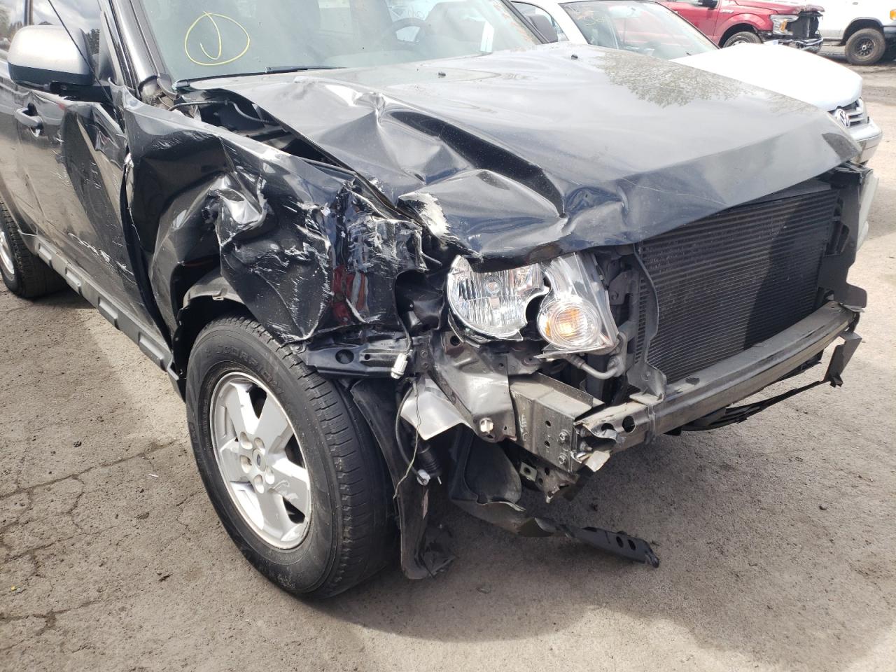 Photo 9 from auction – 2011 FORD ESCAPE XLT with VIN 1FMCU0DG7BKB90598