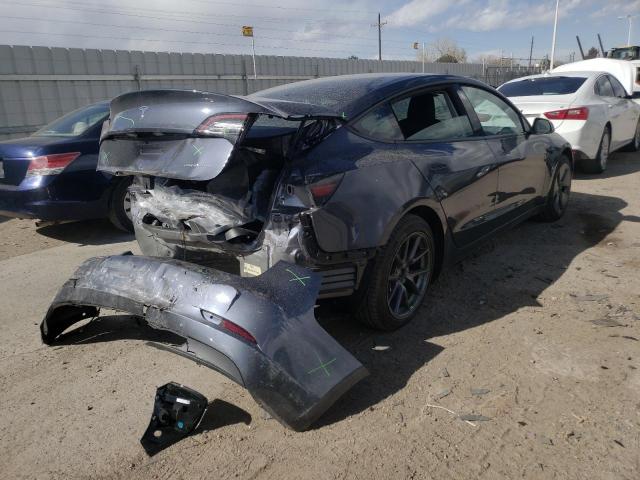 Photo 4 from auction – 2022 TESLA MODEL 3 with VIN 5YJ3E1EB9NF179534