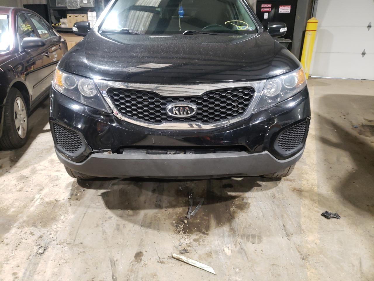 Photo 9 from auction – 2013 KIA SORENTO LX with VIN 5XYKTDA25DG384185