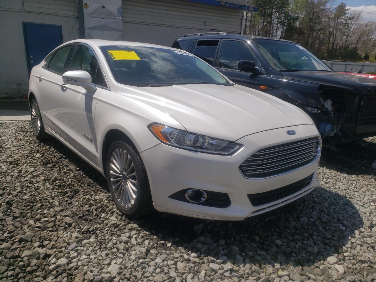 FORD FUSION TIT 2013 with VIN 3FA6P0RU9DR355479 - Photo from auction