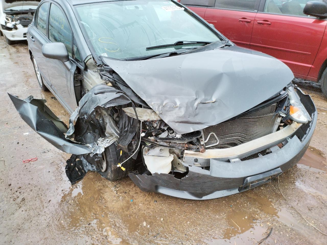 Photo 9 from auction – 2011 HONDA CIVIC LX with VIN 19XFA1F57BE026105