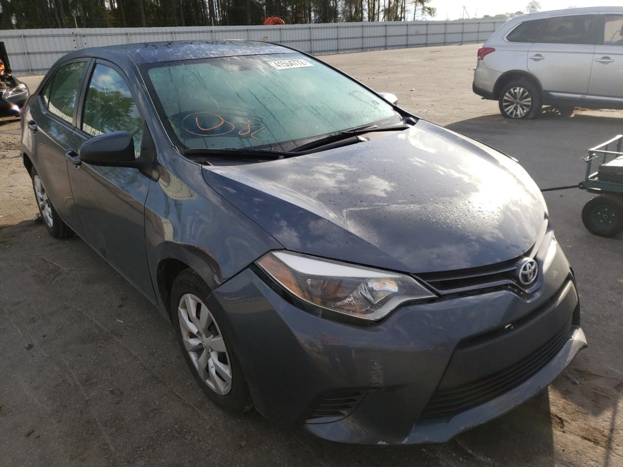 TOYOTA COROLLA L 2016 with VIN 5YFBURHE4GP492890 - Photo from auction