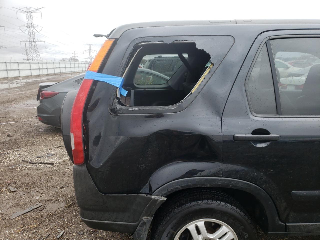 Photo 9 from auction – 2004 HONDA CR-V EX with VIN JHLRD78814C035314
