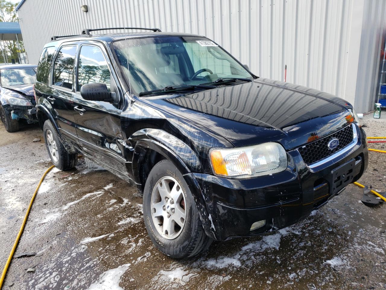Photo 9 from auction – 2003 FORD ESCAPE LIM with VIN 1FMCU94113KE11209