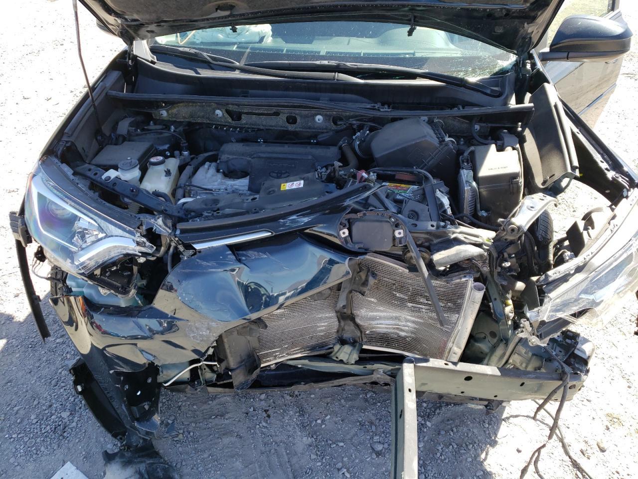 Photo 7 from auction – 2018 TOYOTA RAV4 LE with VIN JTMZFREV4JJ208229