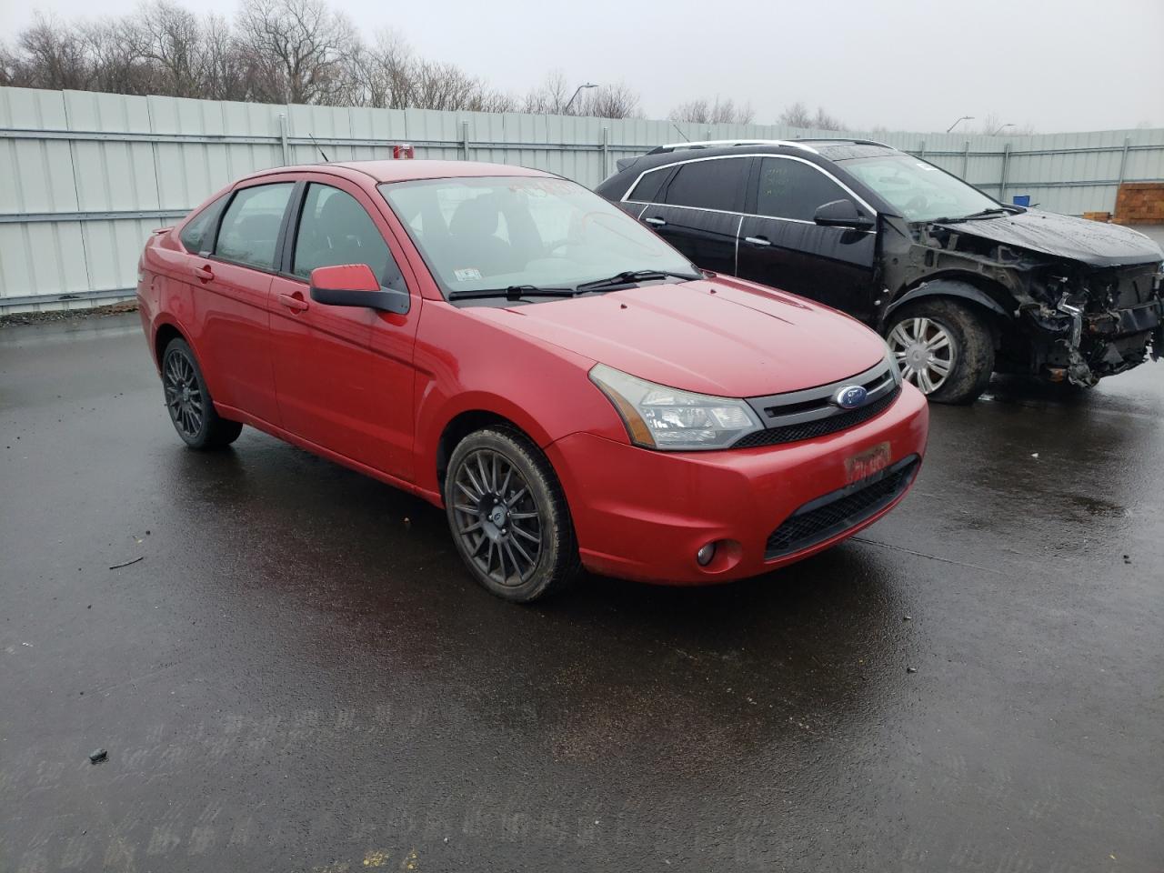 FORD FOCUS SES 2010 with VIN 1FAHP3GN0AW114697 - Photo from auction