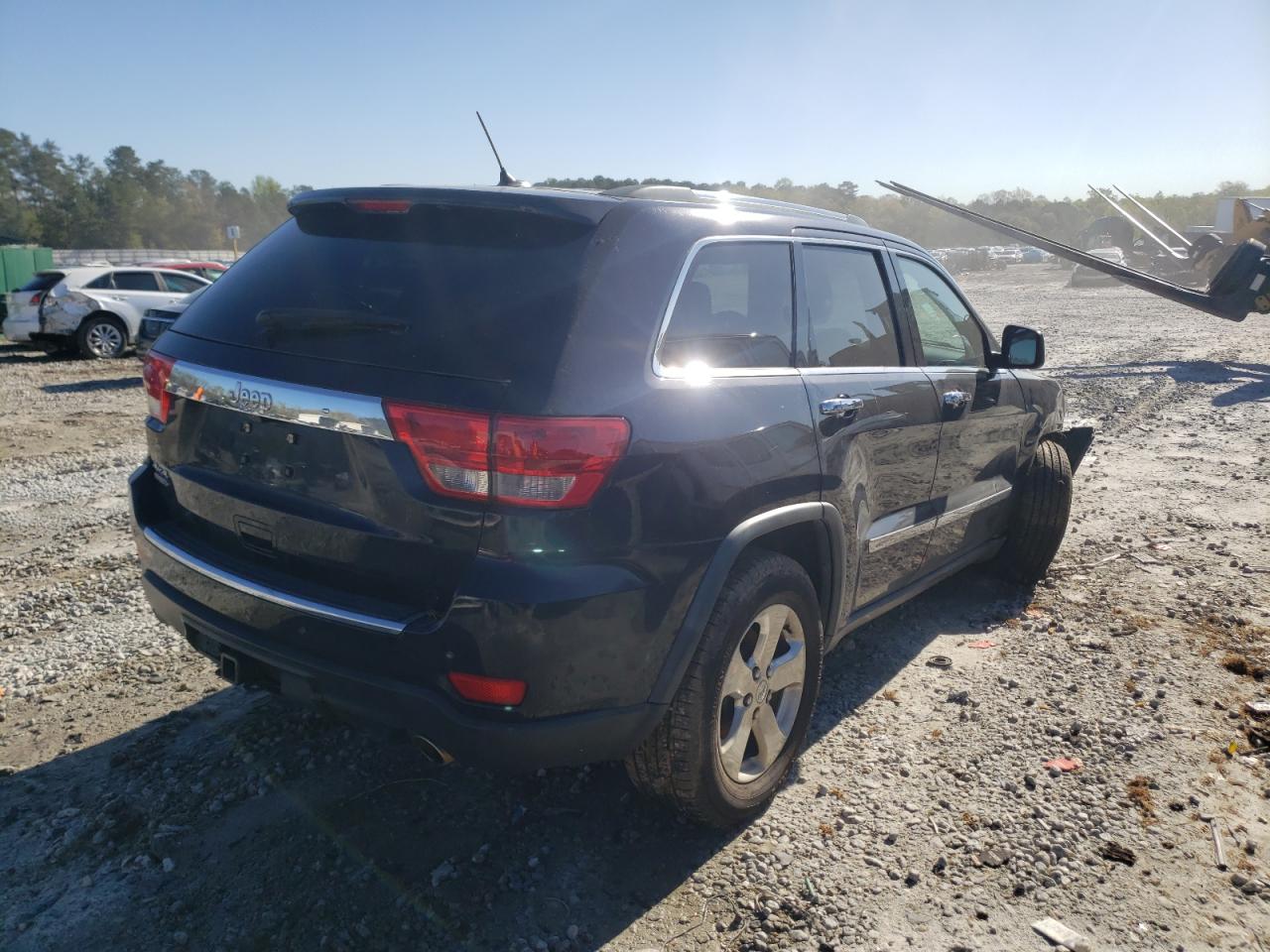 Photo 4 from auction – 2011 JEEP GRAND CHER with VIN 1J4RR5GG1BC541437