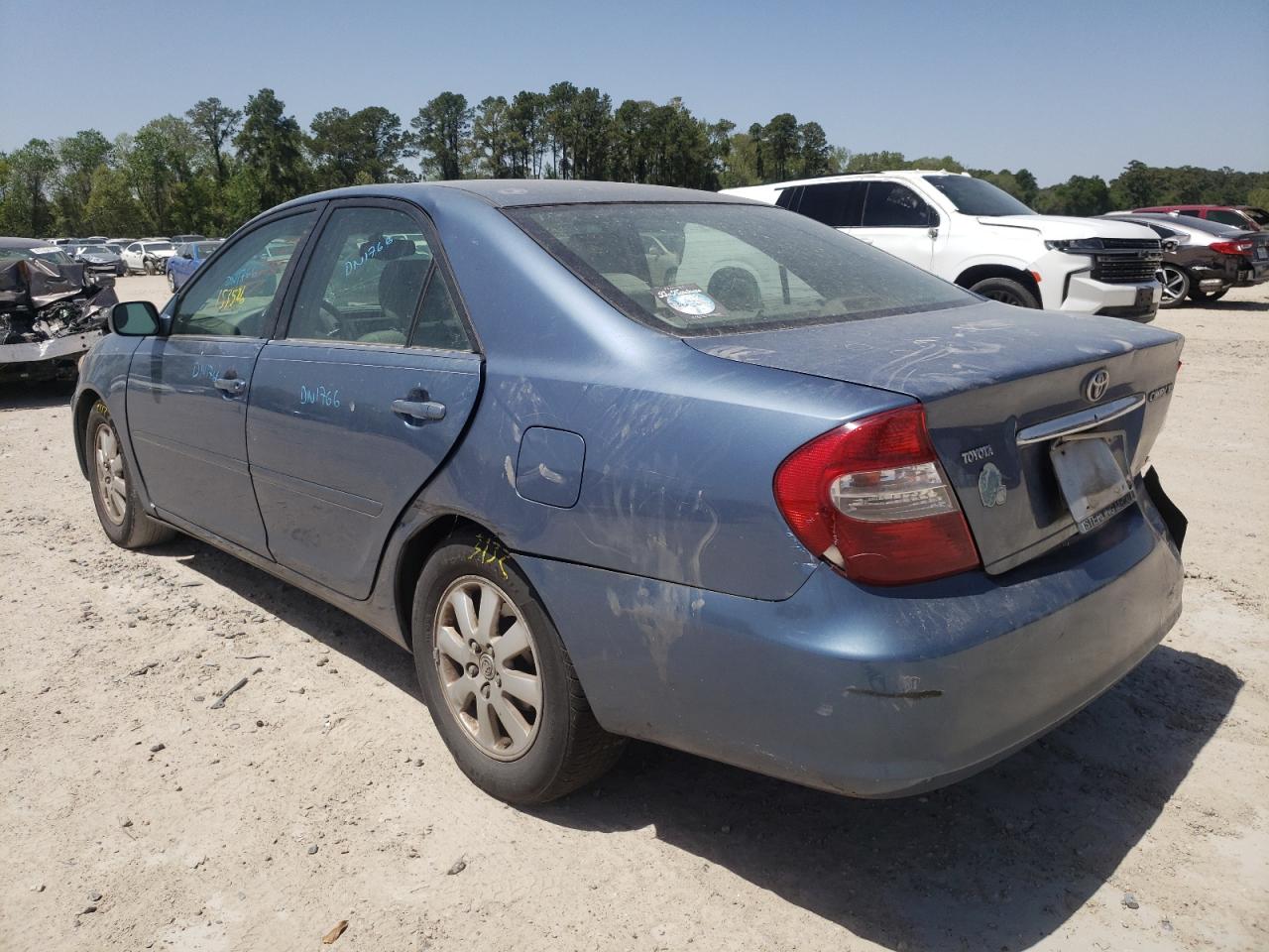 Photo 3 from auction – 2002 TOYOTA CAMRY LE with VIN JTDBE30KX20097594
