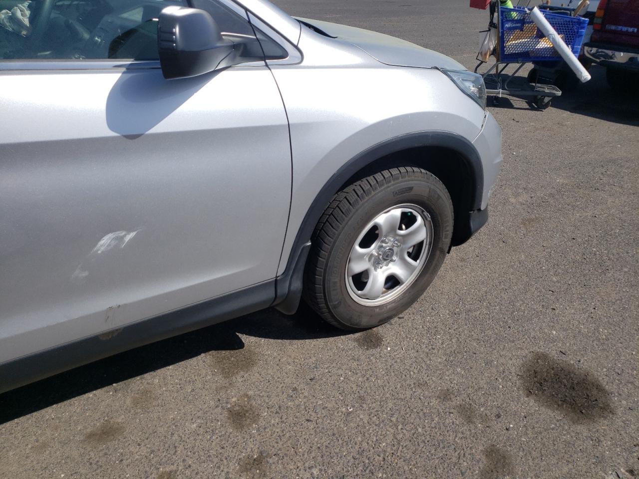 Photo 10 from auction – 2015 HONDA CR-V LX with VIN 5J6RM3H36FL002168