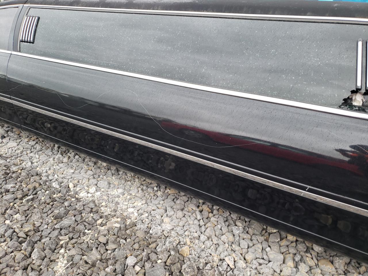 Photo 9 from auction – 2003 LINCOLN TOWN CAR E with VIN 1L1FM81W33Y619811