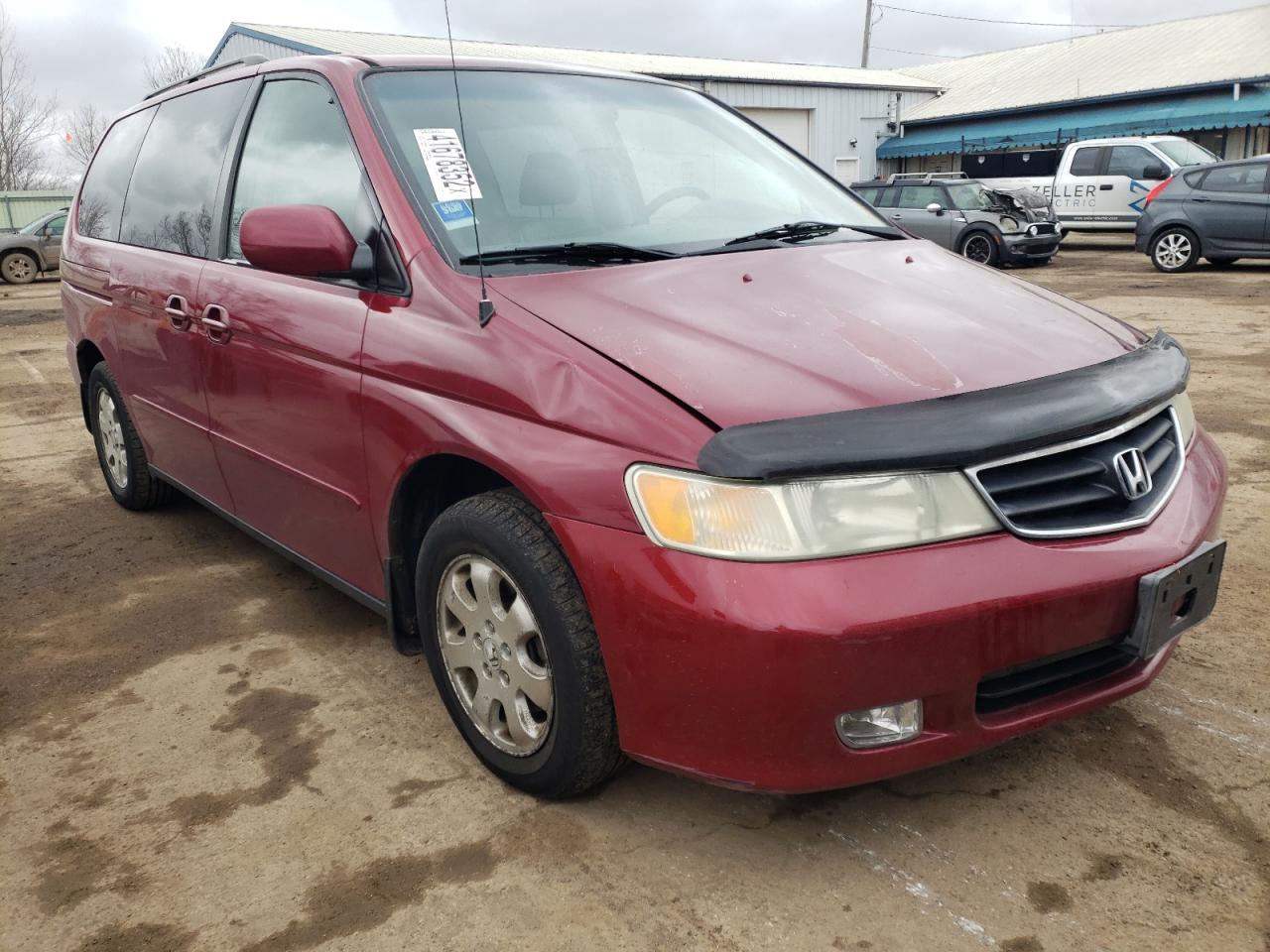 HONDA ODYSSEY EX 2002 with VIN 2HKRL18072H518573 - Photo from auction