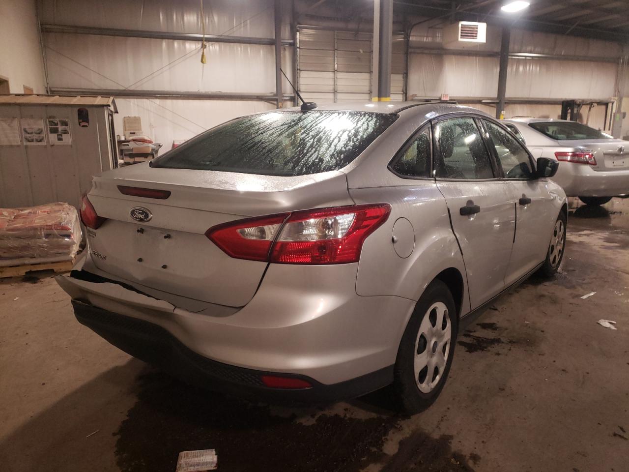 Photo 4 from auction – 2013 FORD FOCUS S with VIN 1FADP3E29DL274638