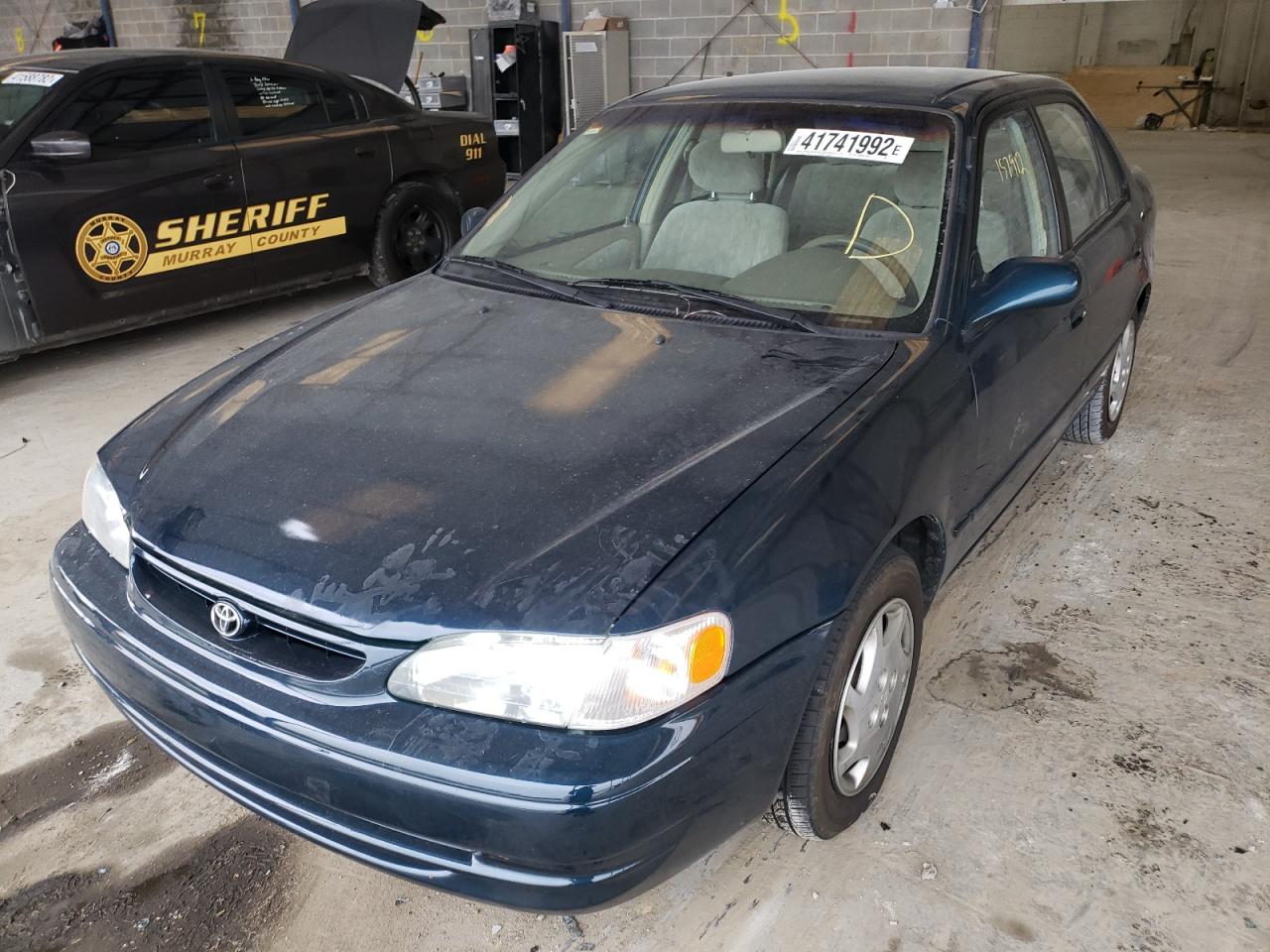 Photo 2 from auction – 2000 TOYOTA COROLLA with VIN 1NXBR12E7YZ359441