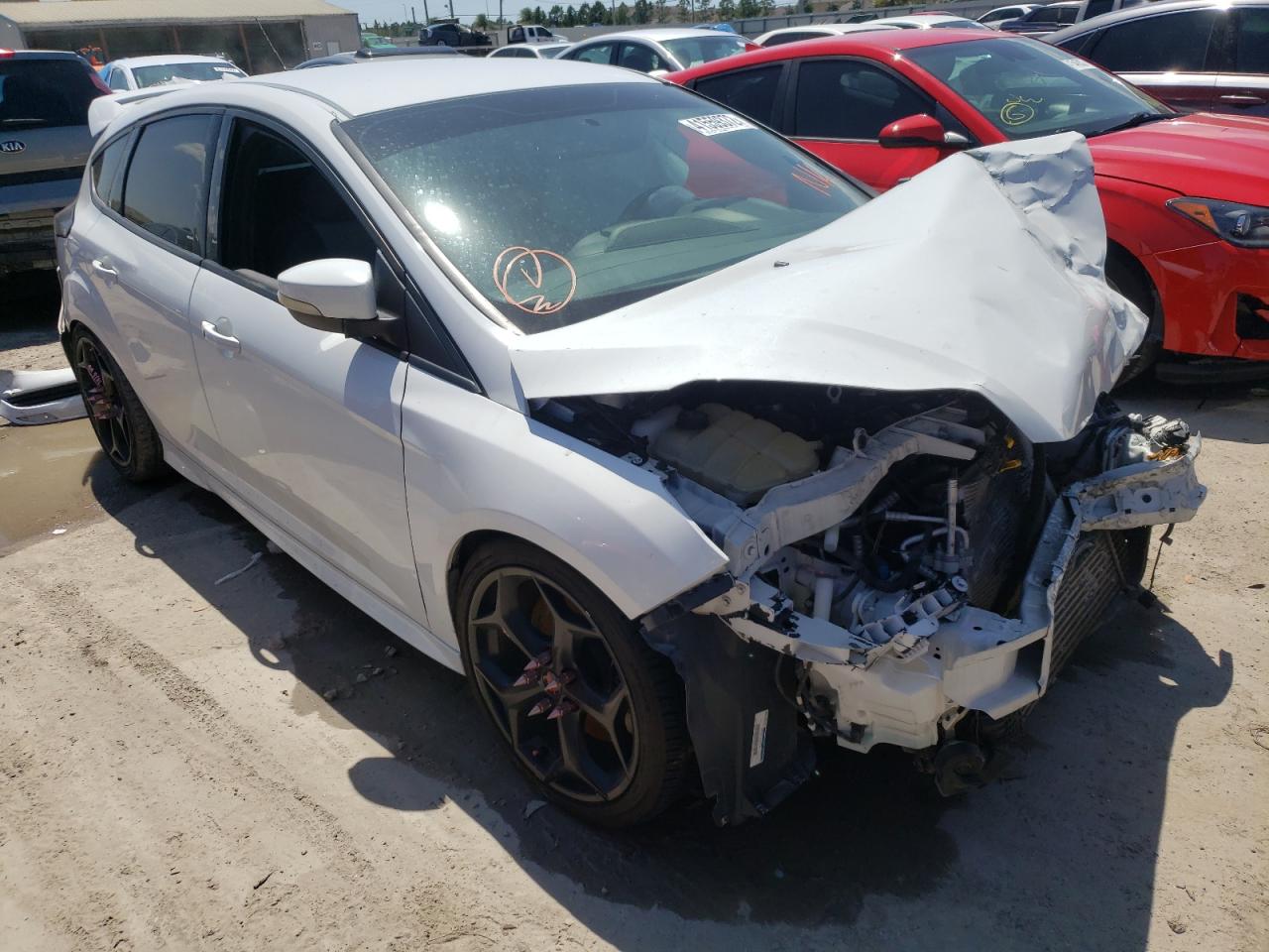 FORD FOCUS ST 2014 with VIN 1FADP3L93EL441335 - Photo from auction