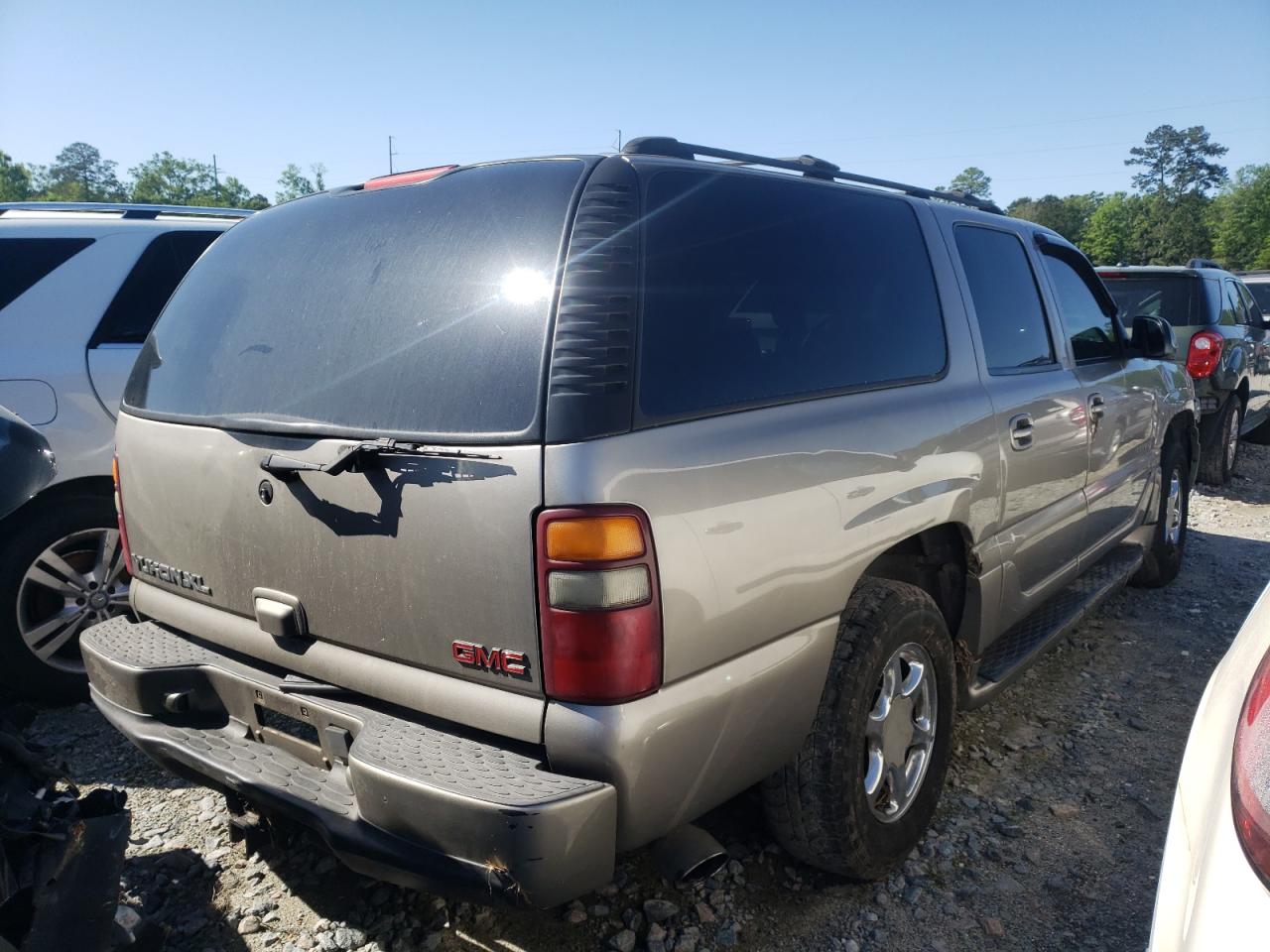 Photo 4 from auction – 2002 GMC DENALI XL with VIN 1GKFK66UX2J190733
